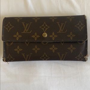 Louis Vuitton Wallet.  Low price due to wear.